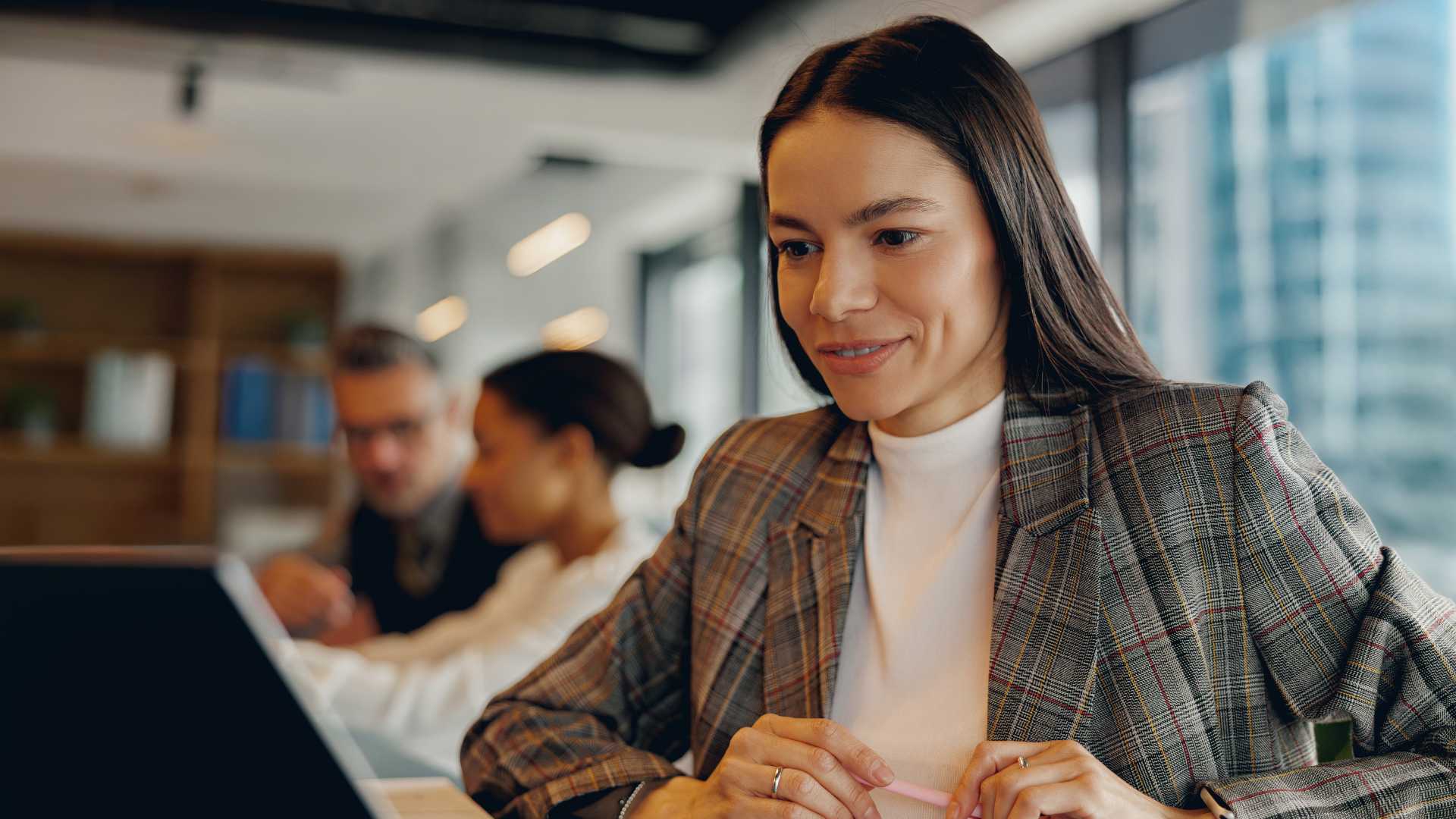 Woman reading blog on screen